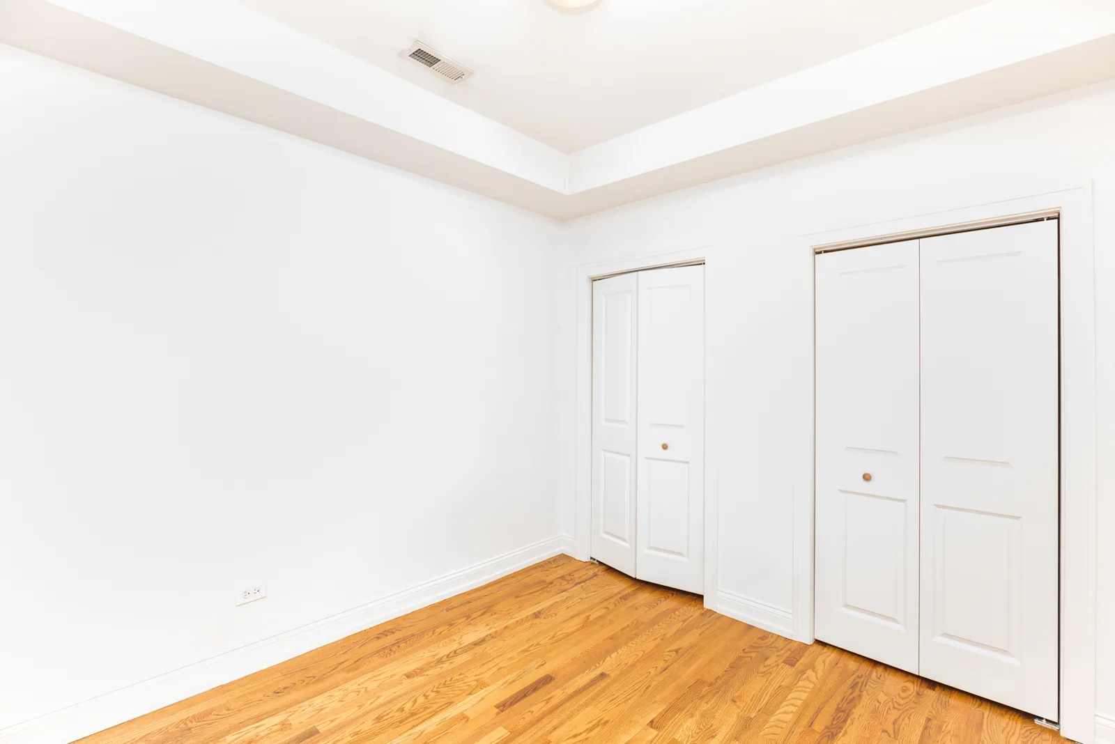 Bedroom with two closets