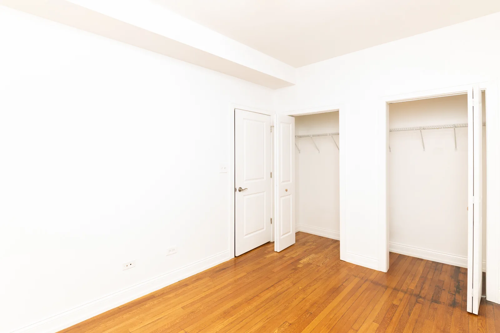 Bedroom with double closets
